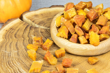 Pumpkin candied fruits on the wood board