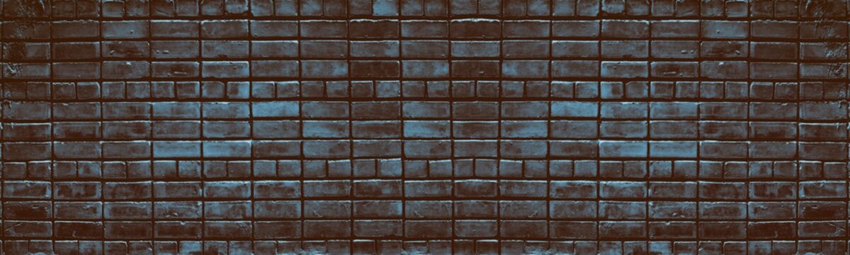Dark blue brick wall wide texture. Rough brickwork masonry. Gloomy grunge widescreen background