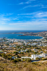 Panorama view  of the  heart shape gulf of parikia village with the traditional white houses in Paros island, Greece.