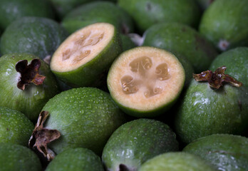 Green feijoa fruit (Acca sellowiana) background pattern.