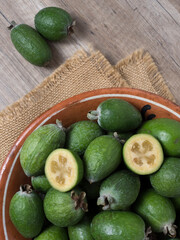Fresh ripe sweet feijoa fruits. Healthy food background.