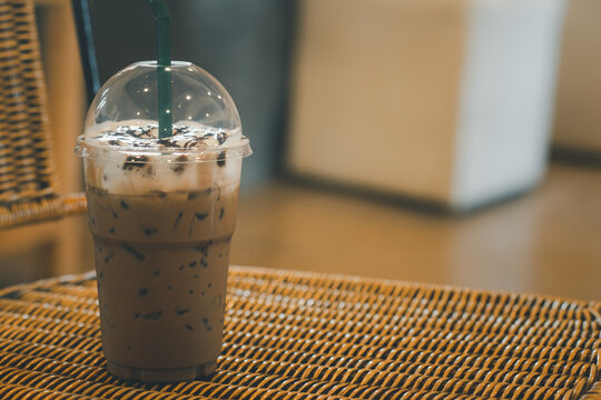 Delicious iced mocha coffee in plastic glass.