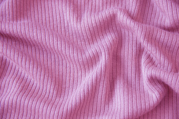 Fototapeta na wymiar ピンクのリブ編みの背景