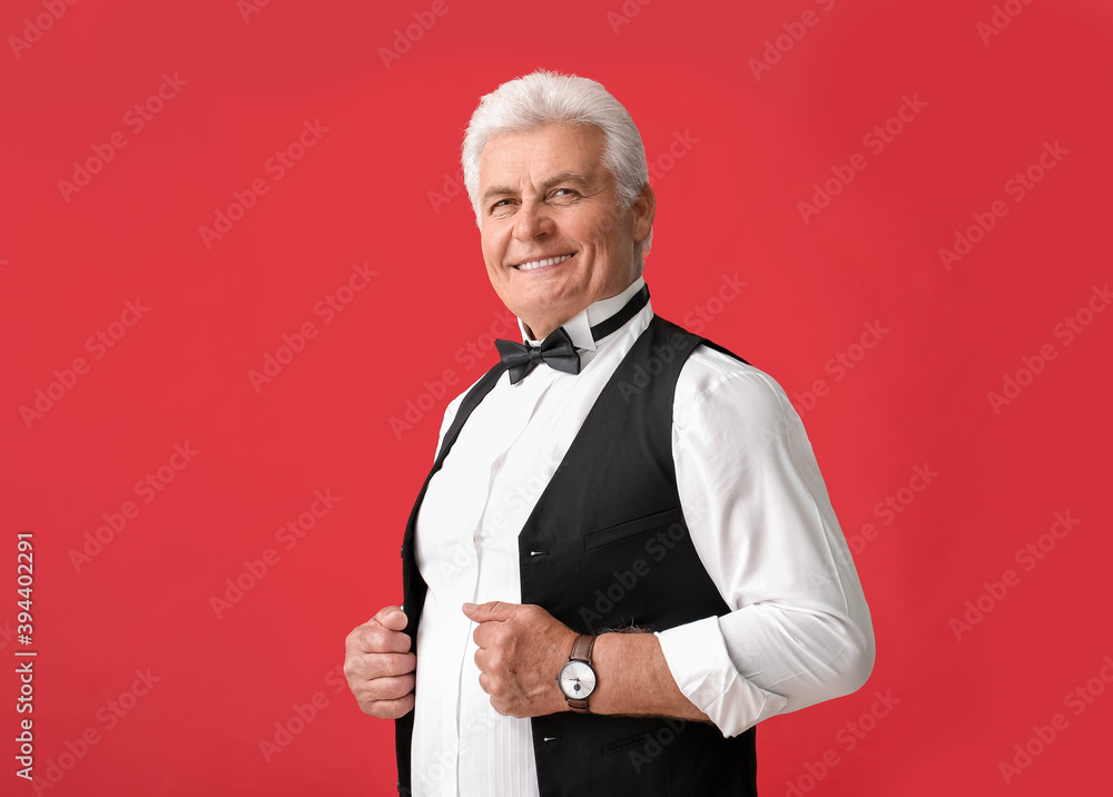 Sticker stylish senior man on color background