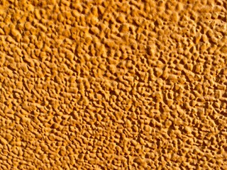Yellow cement texture background 