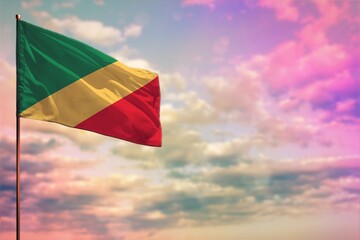 Fluttering Congo flag mockup with the space for your content on colorful cloudy sky background.