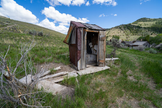 Old wooden outhouse bathroom in Bannack Ghost Town Montana