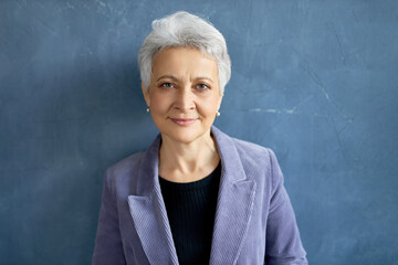 Success, career, business and people concept. Isolated shot of stylish self-assured middle aged...