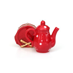 Red ceramic Christmas toys (kettle and drum) isolated on white background