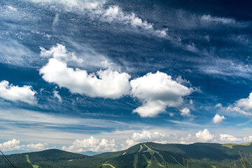 Beautiful clouds over the mountains. Summer landscape.  Ukrainian Carpathians