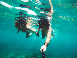 Snorkeling Couple underwater selfie