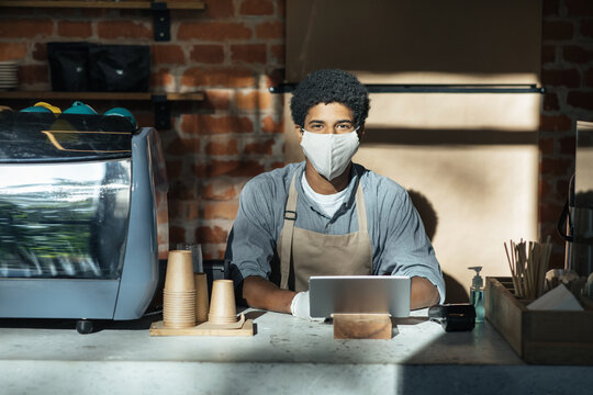 Online ordering coffee to go and bartender work during social distancing