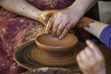 Craftsman working clay