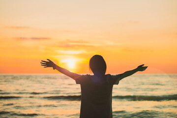 Women praying enjoy Outdoor on blurred background nature outdoor concept hope freedom silhouette...