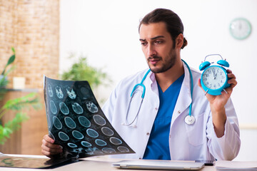 Young male doctor radiologist working in the clinic