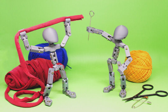 Articulated dolls sewing something new
