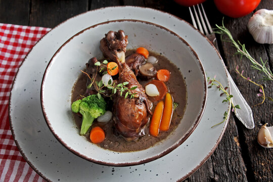 Traditional French cuisine - Coq Au Vin, chicken in wine