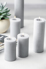 Beautiful aroma candles on table