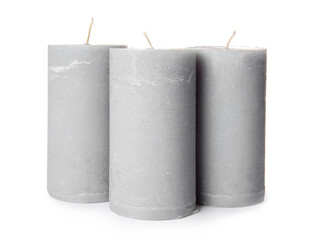 Wax candles on white background