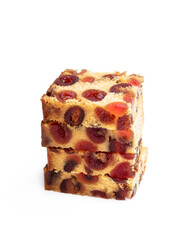 Stack of Cherry Madeira cake slices isolated on white background