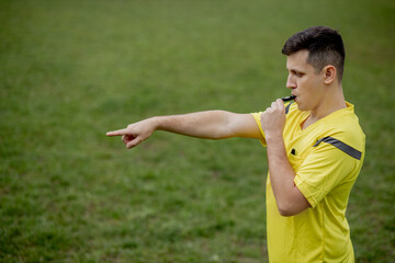 Referee indicates a violation of the rules. Concept of sport, rules violation, controversial...