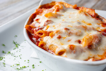 A view of a mostaccioli parmigiana casserole dish.