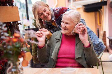 Woman sitting at the table at the street cafe