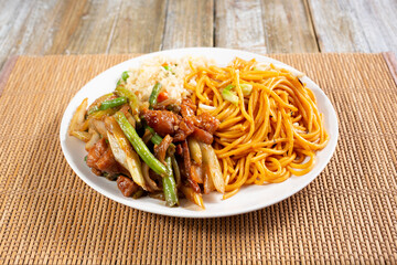 A view of a 1 item fast food Chinese combo plate, in a restaurant or kitchen setting.