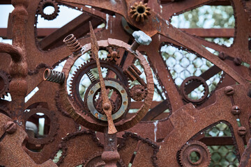 Rusty iron mechanical parts and gear wheels. Steampunk texture