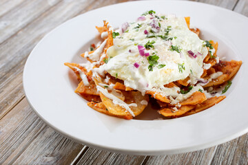 A view of a plate of chilaquiles.