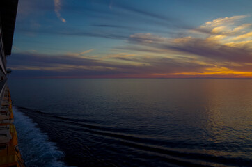 Dream holiday or vacation on luxury cruiseship or cruise ship liner at sea with sunset, sunrise or...