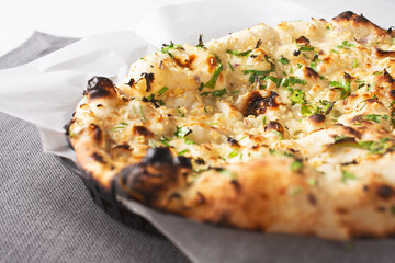 A view of an order of garlic naan.