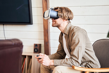 Man with virtual reality headset or 3d glasses