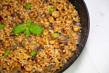 Traditional spanish paella with vegetables and chicken.