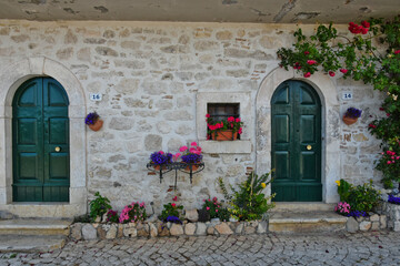 The door of an old house in Scontrone, a medieval village in the Abruzzo region, Italy.