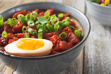 A closeup view of a spicy tuna rice bowl