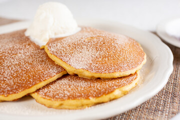 A view of a plate of pumpkin spice pancakes.