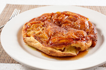 A view of an baked apple pancake.