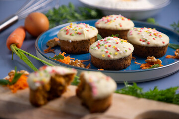 Mini carrot cake with white chocolate cover and sprinkles