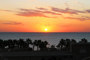 The sun rose over the sea in the early morning