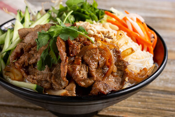 A view of a bowl of beef vermicelli noodles, also known as bún.