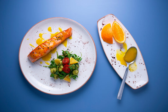 Grilled Salmon With Orange Sauce And Gnocchi Pesto Salad.