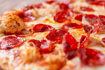 A closeup view of a pepperoni pizza.