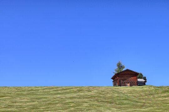 Alpine landscape with typical buildings in South Tyrol, Italy