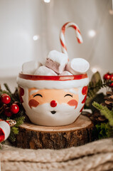 Christmas coffee with marshmallow and candy cane