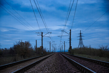 Fototapeta na wymiar Railroad branch in cloudy morning or evening
