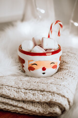 Christmas coffee with marshmallow and candy cane