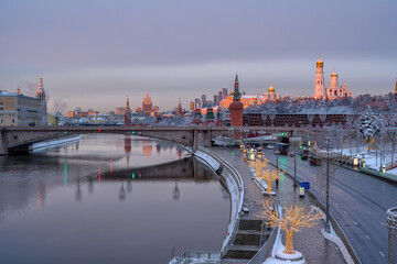 Sunrise view of Moscow Kremlin, embankment of Moscow River in Moscow, Russia. Architecture and landmark of Moscow