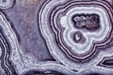 dark violet color lines in agate structure close-up