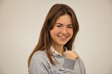 Girl student beautiful joy delight happiness white background close-up